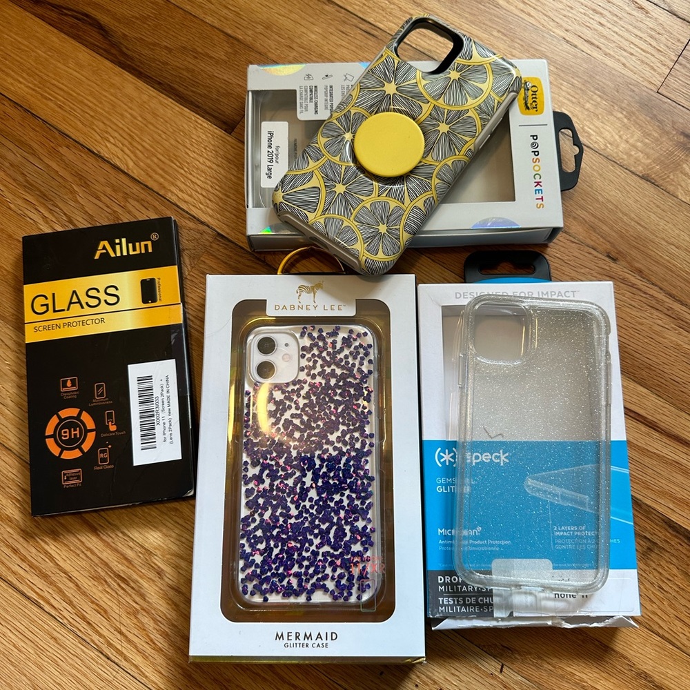 iPhone 11 cases; OtterBox lemon pop-socket, Glitter cases; one a speck case!